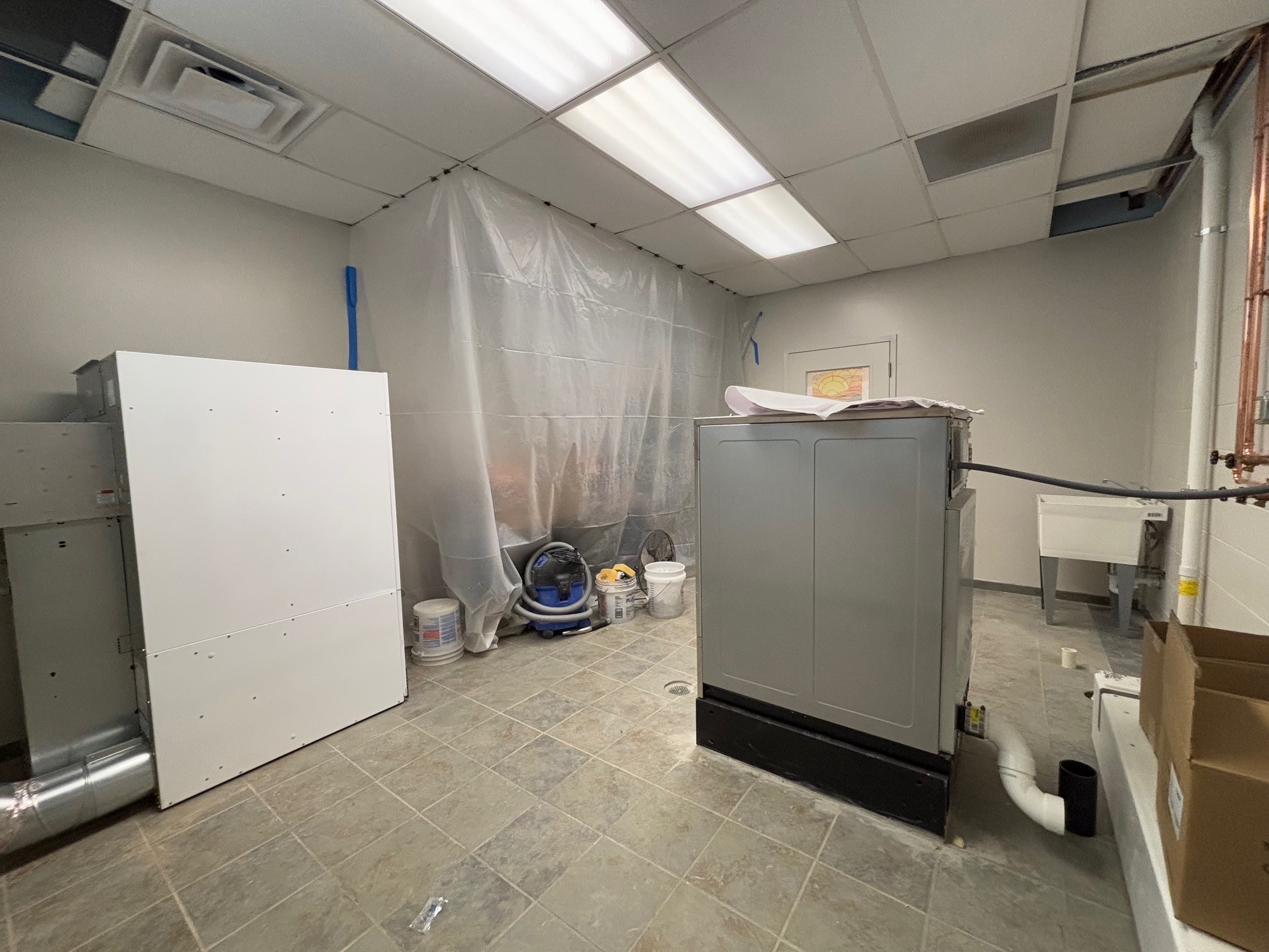 Washer and dryer animal shelter room